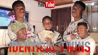 AFRICAN HOME: IDENTICAL TWINS