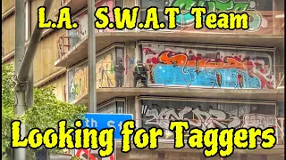 L.A.  S.W.A.T.  Team searching  abandoned high rise building for Graffiti Taggers