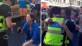 Police officer accepts girlfriend's marriage proposal on London Pride route