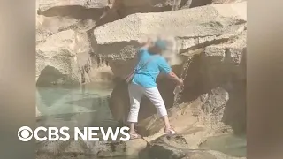 Video shows woman using Rome's Trevi Fountain to fill water bottle