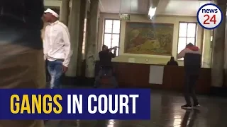 WATCH: Police draw arms as rival gang members clash in Joburg court