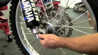 The correct way to tighten your dirtbike's front wheel