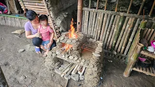 Girl builds stove by mixing soil and stones - single mother