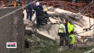 South Africa building site collapses, one dead, dozens trapped