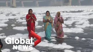 Clouds of toxic foam float on surface of India's sacred Yamuna river