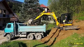 JCB 8085 excavator digging clay and loading Tatra truck