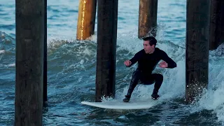 CATCH SURF SOFT TOP SURFING THROUGH PIER!