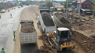 China Help Development Long Road In Cambodia Bulldozer SHANTUI & Dongfeng 24Ton Dumptruck Move Stone