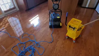 Restoring hardwood floors from years of wax build-up for a repeat client