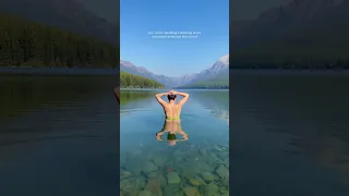 Morning swims in mountain lakes ✨ bowman lake Glacier National park #couplegoals #coupleswhotravel