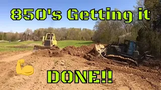 Incredible video of both 850 dozers pushing out a trench to drain a hole others have failed at