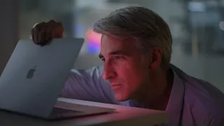 Apple Event- Craig Federighi looks at a Mac