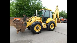 NEW HOLLAND LB115  BACK HOE WORKING DEMO FOR CUSTOMER