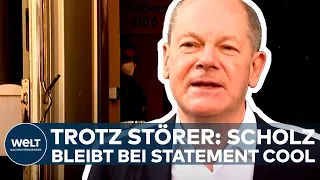 BUNDESTAGSWAHL 2021: Störer bei Statement! SPD-Kanzlerkandidat OLAF SCHOLZ nach seiner Stimmabgabe