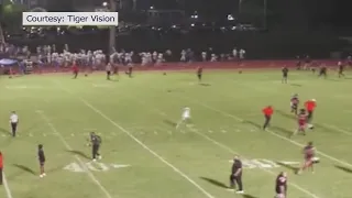 Teen opens fire at Florida high school football game, deputies say