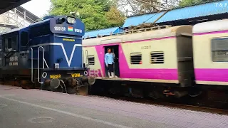 New WDM3A Train Engine Crossing with The Local Aerodynamic purple colour EMU Train