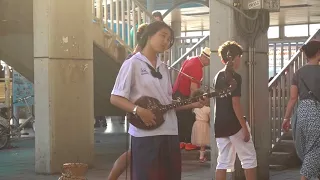 Thai Girl playing guitar @ Christmas day of 2017 ~1