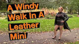 A Windy Walk In A Leather Mini