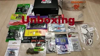 Unboxing посылки с катушкой, бейсболкой и приманками от интернет магазина Fmagazin