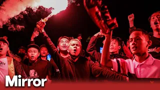 174 football fans and two police officers killed in Indonesia mass riot