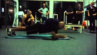 Guinness World Record for the longest time in an abdominal plank position with a 100-lb pack