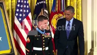 OBAMA PUTS MEDAL OF HONOR ON KYLE CARPENTER