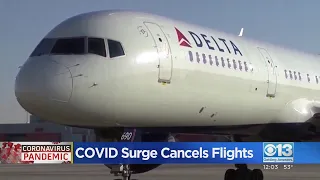 COVID Surge Cancels Flights