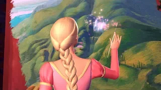 Barbie as Rapunzel - The magical paintbrush creates a portal towards the village