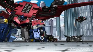 Transformers Cybertron / Optimus Prime uses Metroplex 's axe