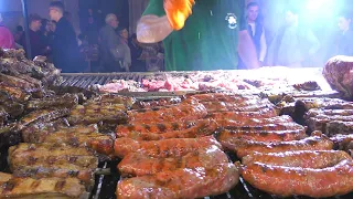 Italy Street Food Festival. Juicy Ribs, Angus, Pork Knuckles, Metres  Long Sausages, Paella