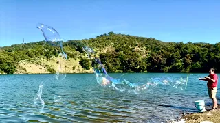 Blissful Giant Bubbles at a Beautiful Lake