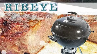 Ribeye on a Weber kettle charcoal grill | Weber Master-Touch