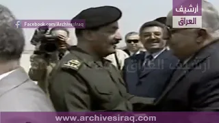 طه ياسين رمضان يترأسه لاستقبال محمد مصطفى ميرو رئيس وزراء سورية بغداد ، العراق 11 أغسطس 2001.