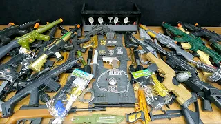 Toy Realistic Rifles, Bead Throwing Pistols, Revolvers and Special Equipment / Box of Toy Weapons