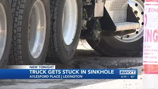 WATCH | Driver taken to Lexington hospital after sinkhole forms under dump truck