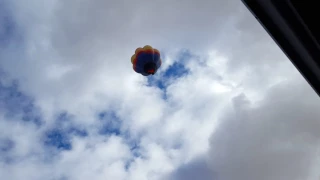 Hot air balloon over the house