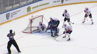 Ivan Zakharchuk muscles his way to the net