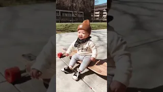 Ziggy boy goes longboard cruising at 7 months :)