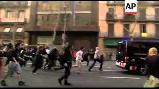 Clashes between police and protesters in Barcelona