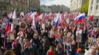 Huge numbers join Immortal Regiment march in Moscow