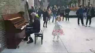 Little girl dancing to Mary Poppins in public!