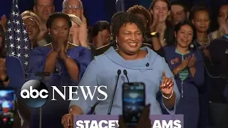 Stacey Abrams gives an enthusiastic speech, stays in the race