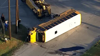 RAW VIDEO | Multiple ambulances respond to school bus rollover crash in SE Houston