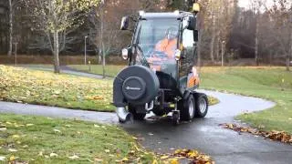 Leaf blower attachment on a front mower