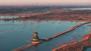 Ice skating in Fryslân: Ryptsjerksterpolder (Mavic 3 Pro footage, 1-2024) Windmill