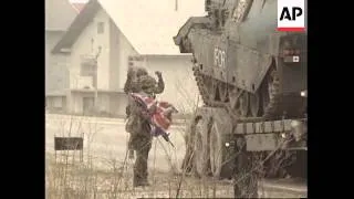 BOSNIA: BRITISH TANKS ARRIVE TO HELP UPHOLD THE PEACE ACCORD