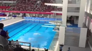 Singapore's diving twins Timothy & Mark Lee diving in the 3m synchronised springboard final