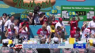 Joey Chestnut wins 12th Nathan`s hot dog eating contest