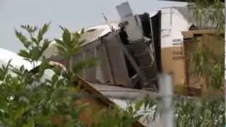 Train crash takes out Missouri highway overpass