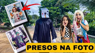 UM NOVO VILÃO COM CABEÇA DE CÂMERA PRENDEU A ARLEQUINA, CORINGA E TODO MUNDO EM FOTOS